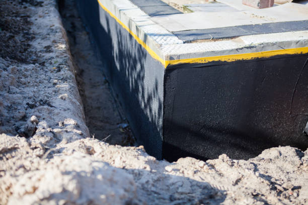 Professional Waterproofing technician working in Eden, NC